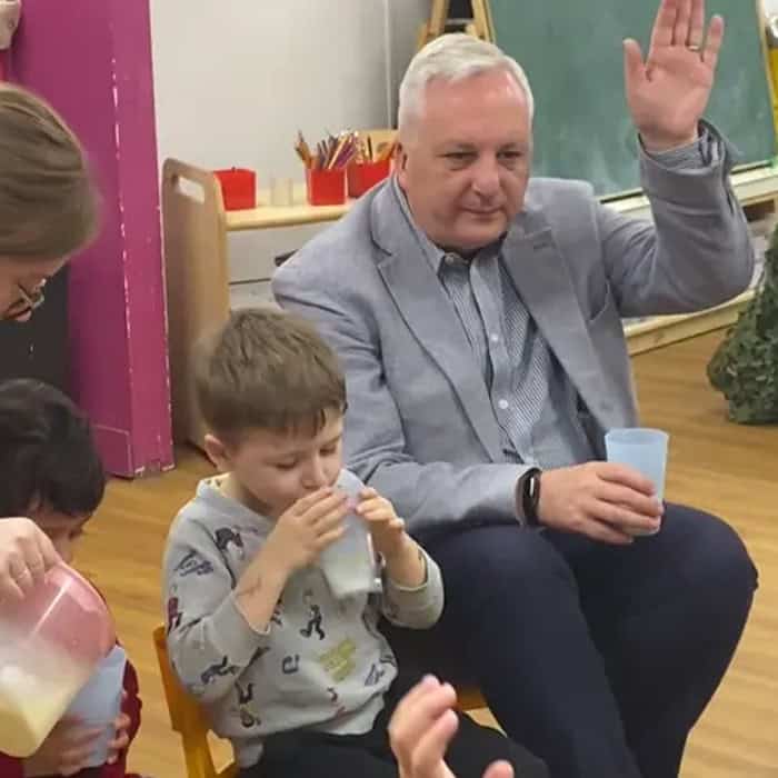 Young children and a teacher enjoying The Great British Milk Break at Monkey Puzzle Day Nurseries in Bexleyheath.